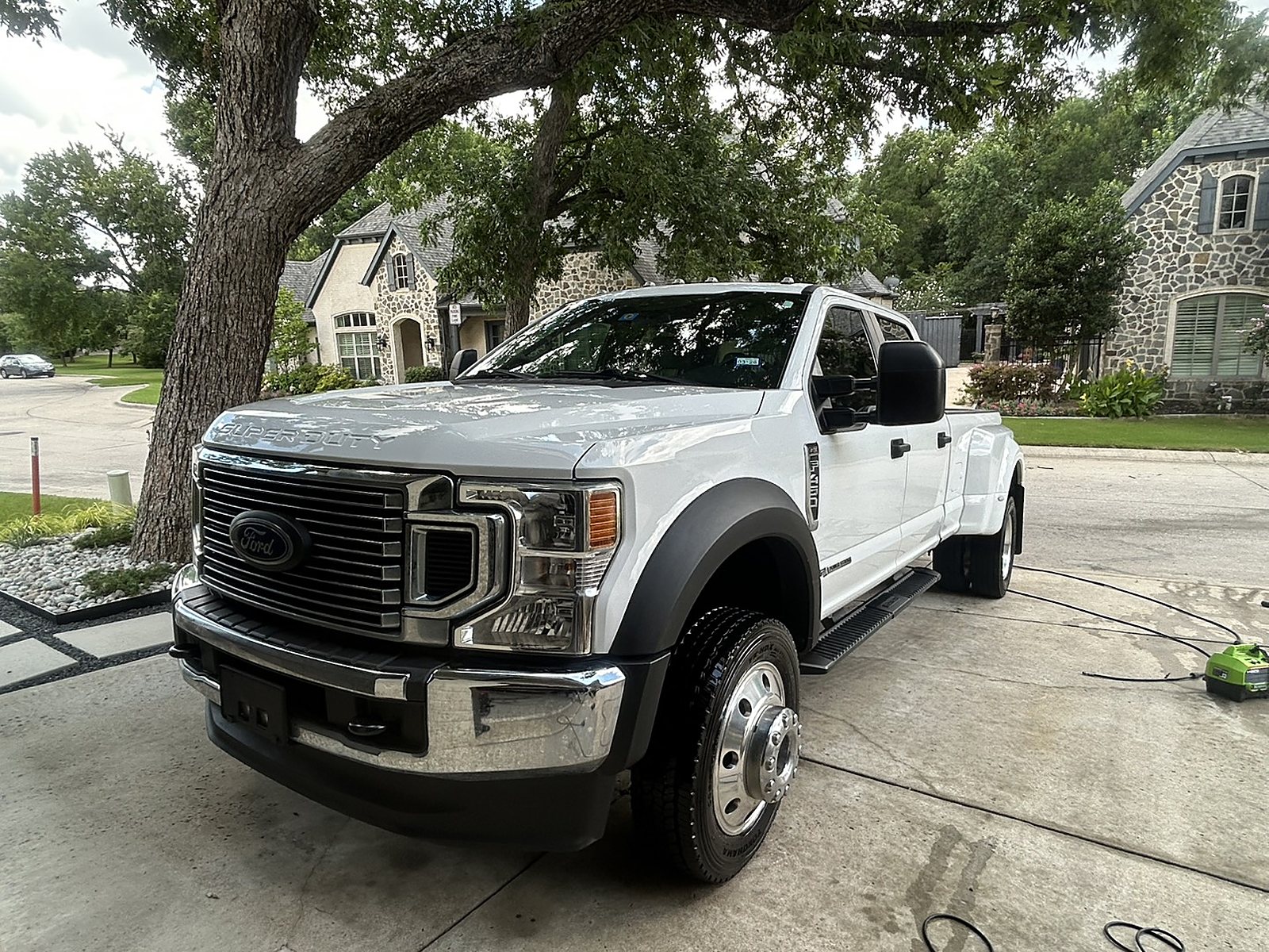 White Ford F-450 washed, dried and dressed on a driveway